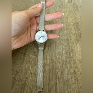 Nominal silver watch for women